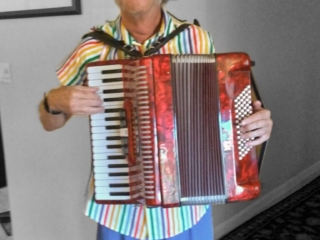 Feeling like he needed to find the music again in his life, Michael acquired a new accordion in 2021. He learned to play as a child because his mother said, "Somebody has to make music for us at weddings and funerals."