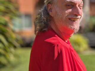 Michael, 3 years after completing the radiation treatments in 2024. Doctors tell him the cancer is "not visible" in the latest scans, however, they are careful not to say that that means the cancer is gone.